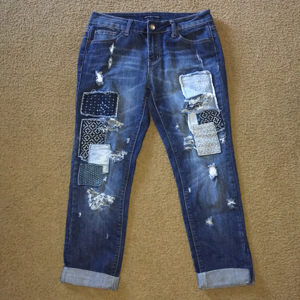 Distressed patchwork jeans